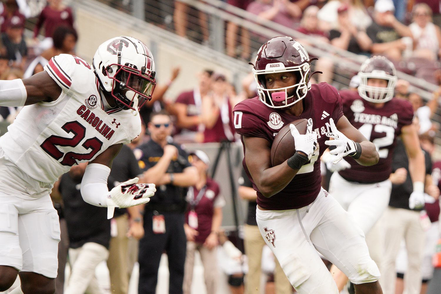 Bam Martin Scott trying to tackle A&M receiver Ainias Smith (28th Oct., 2023)